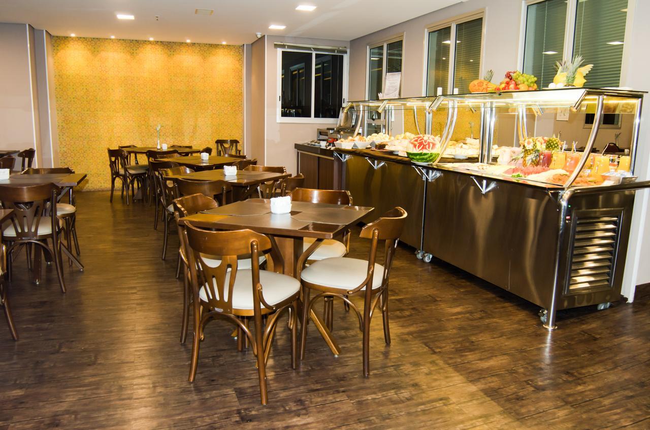 西达德新星伊姆帕尔套房酒店 贝洛哈里桑塔 外观 照片